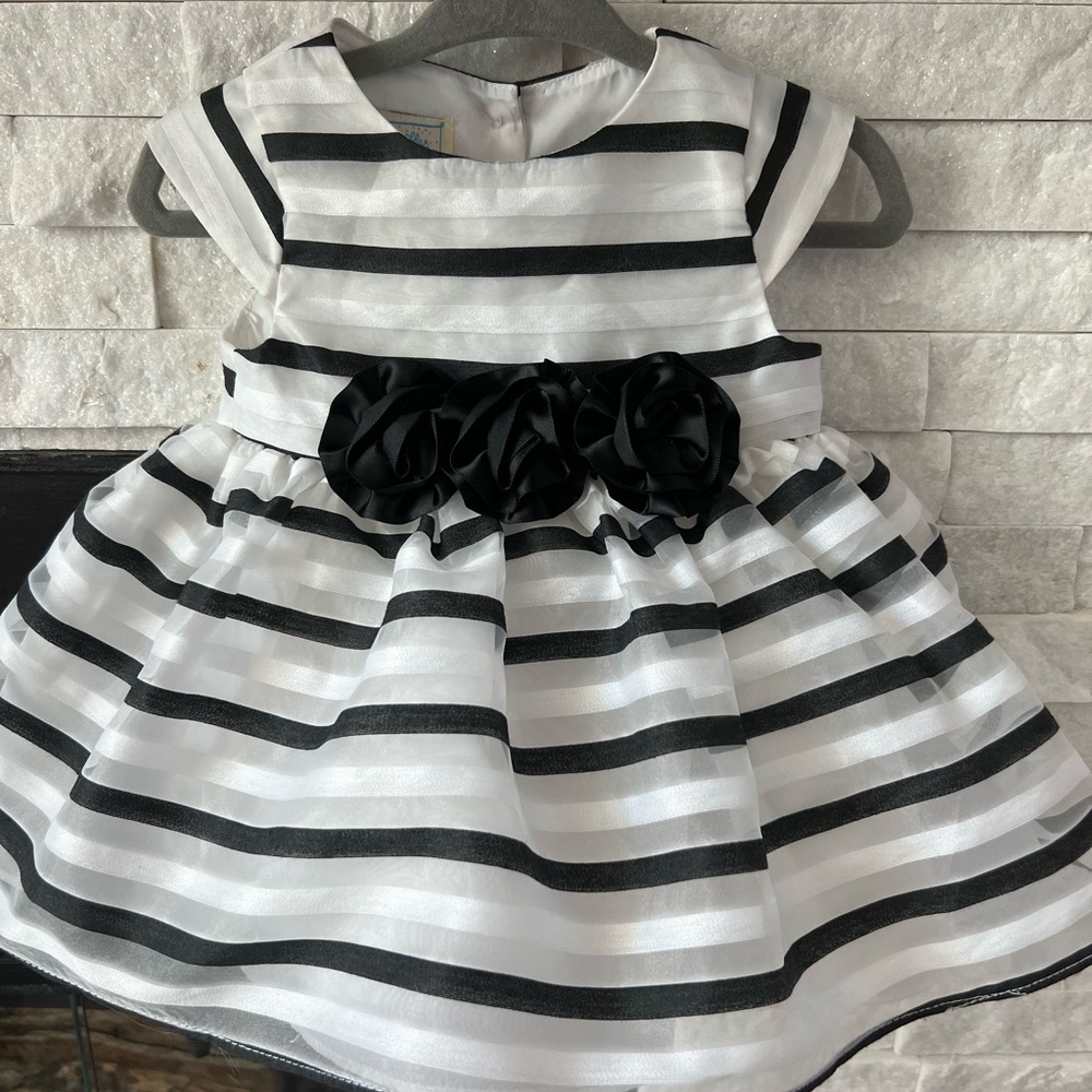 Black & white polyester stripe dress with black carnation details